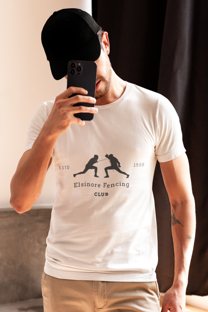 man wearing Elsinore Fencing Club shirt