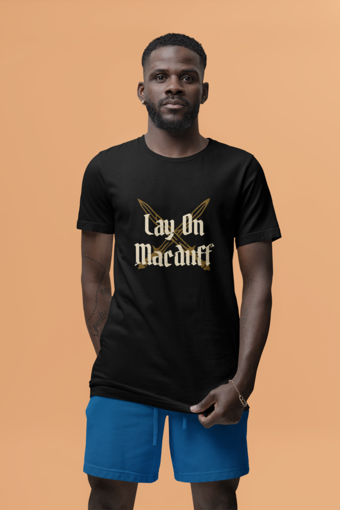 man in Lay On Macduff tshirt